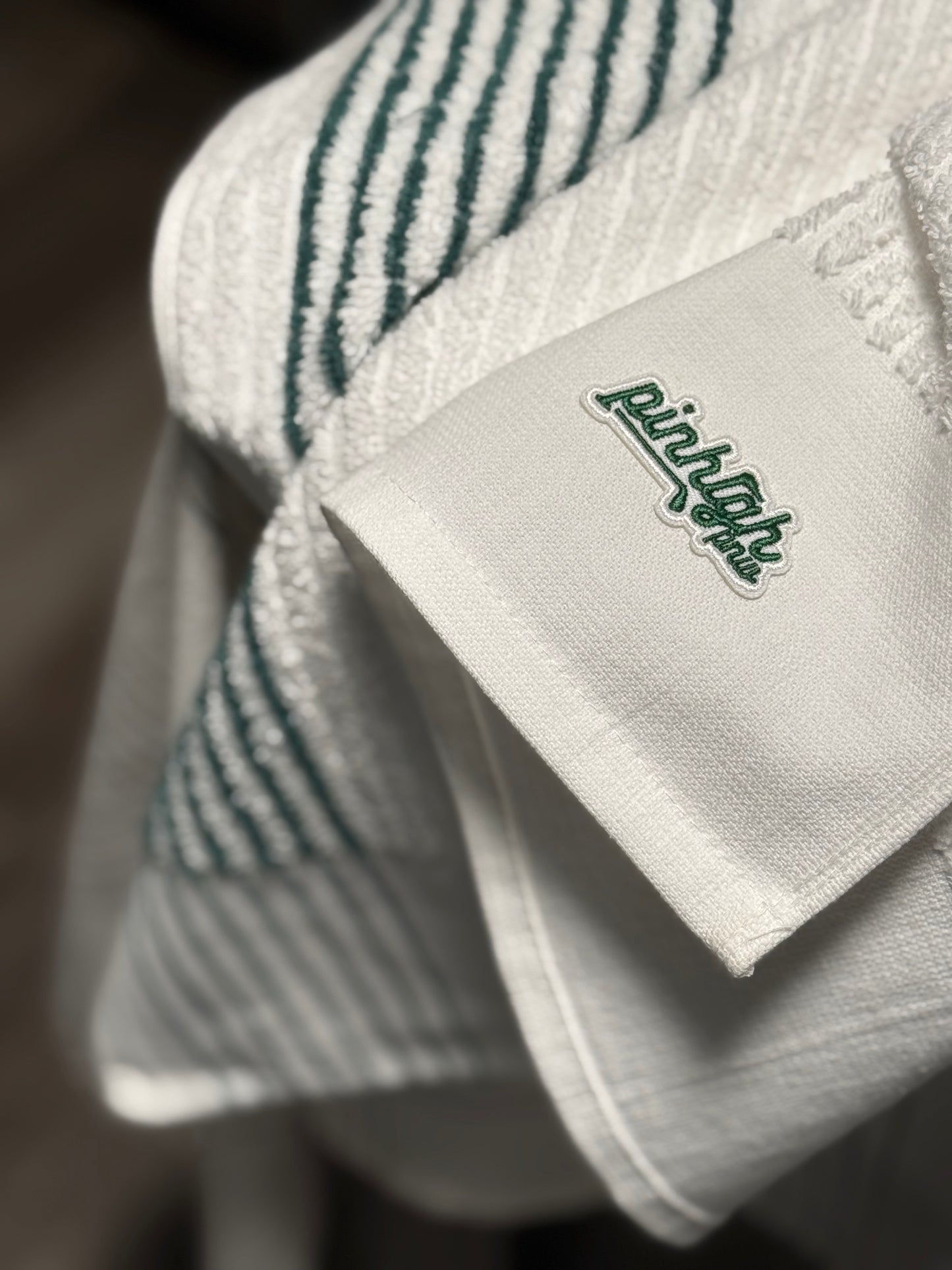 Pin high tour towel